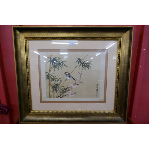 99C - A Chinese watercolour on silk, bird amongst bamboo and blossom, 36 x 47cms, framed