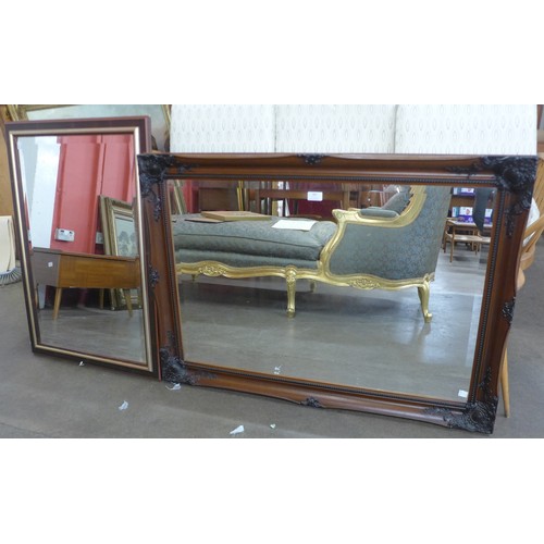 483 - A Victorian style walnut effect mirror and one other