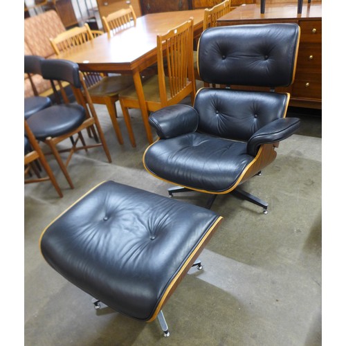 155 - A Charles & Ray Eames style simulated rosewood and black leather revolving lounge chair and ottoman