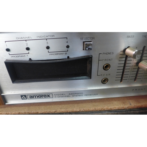 2120A - An Amerex model A4CR200 4- channel stereo receiver and Sanyo 4540K solid state turn table music syst... 