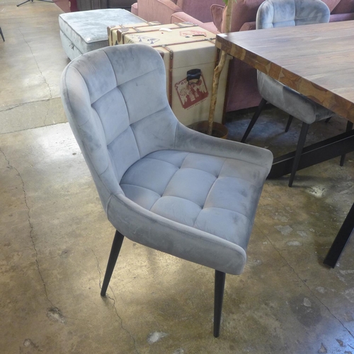 1350 - A Hoxton 'X' base dining table and four Kos grey velvet dining chairs * this lot is subject to VAT