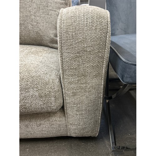 1386 - A Shada hopsack aluminium velvet upholstered three seater sofa