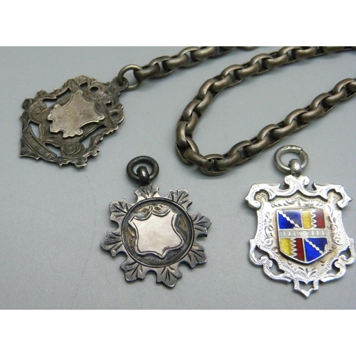 1004 - A silver fob and chain and three other silver fob medals, 54g