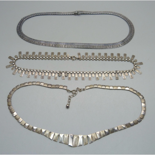 1005 - Three silver necklaces, 57g