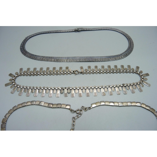 1005 - Three silver necklaces, 57g