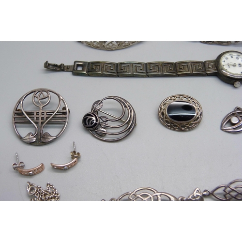 1008 - A collection of silver jewellery including Arts and Crafts style and Celtic style and a silver wrist... 