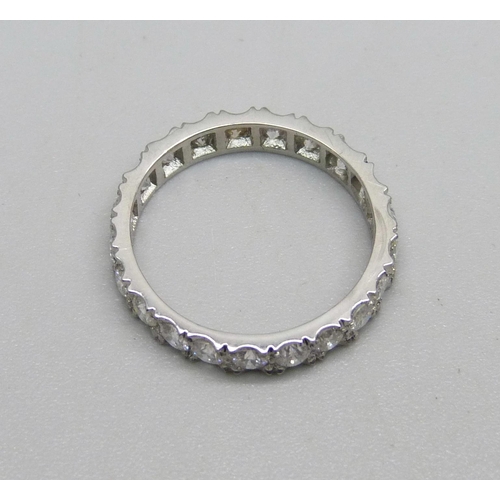 1019 - A platinum and diamond eternity ring, (marked plat on side of ring), 3g, L