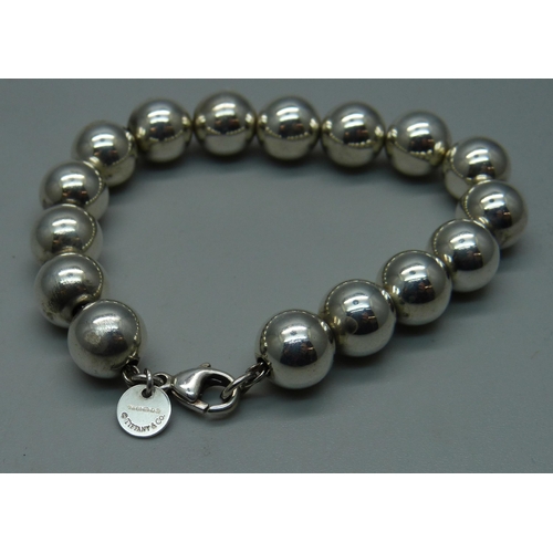 1020 - A Tiffany & Co. sterling silver ball bracelet, 17g, 17.5cm, abrasion to one bead