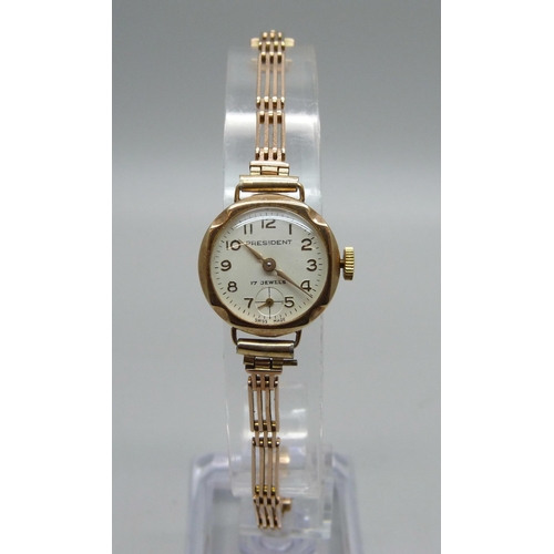 1022 - A lady's 9ct gold cased President wristwatch on a 9ct gold bracelet, weight without movement 10.4g