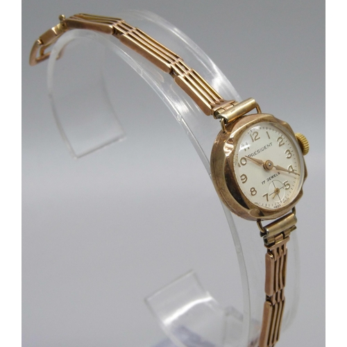 1022 - A lady's 9ct gold cased President wristwatch on a 9ct gold bracelet, weight without movement 10.4g