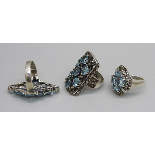 1023 - Three silver and pale blue stone set rings, Q and 2x R