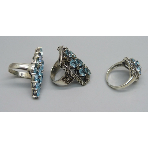 1023 - Three silver and pale blue stone set rings, Q and 2x R