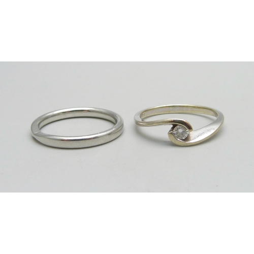 1032 - A hallmarked platinum wedding ring, 4.3g, M/N, and a 9ct white gold and diamond ring, 2g, M/N