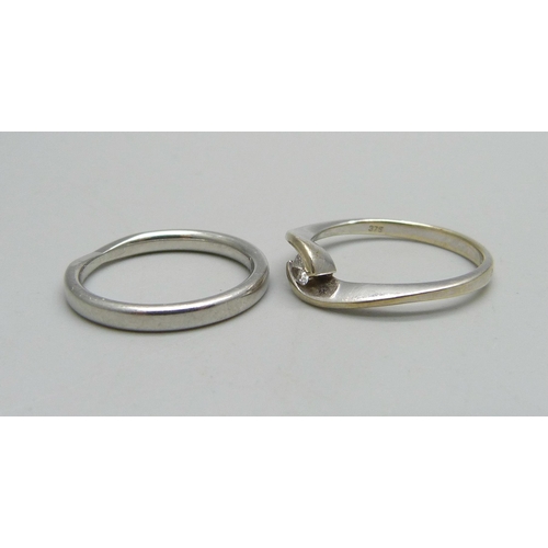 1032 - A hallmarked platinum wedding ring, 4.3g, M/N, and a 9ct white gold and diamond ring, 2g, M/N