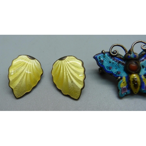 1033 - A white metal and enamel butterfly brooch and two pairs of silver and enamel earrings, both marked N... 