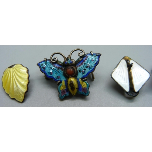 1033 - A white metal and enamel butterfly brooch and two pairs of silver and enamel earrings, both marked N... 