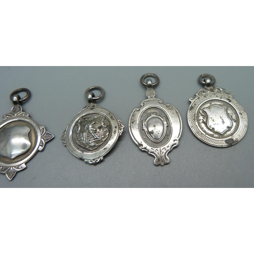 1035 - Six silver fob medals, 29g