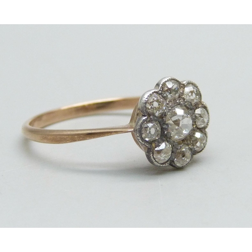 1039 - A Victorian diamond cluster ring with gold shank and silver setting, 1.7g, N/O