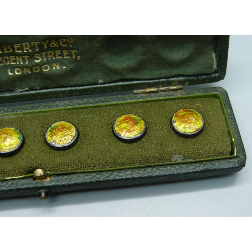 1040 - A cased set of silver and enamel buttons by Liberty & Co., in original named box (one button missing... 