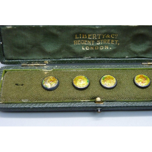 1040 - A cased set of silver and enamel buttons by Liberty & Co., in original named box (one button missing... 