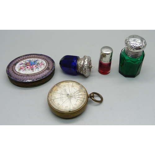 1052 - A pocket barometer, a/f, two silver topped scent bottles, a blue glass and white metal topped vinaig... 