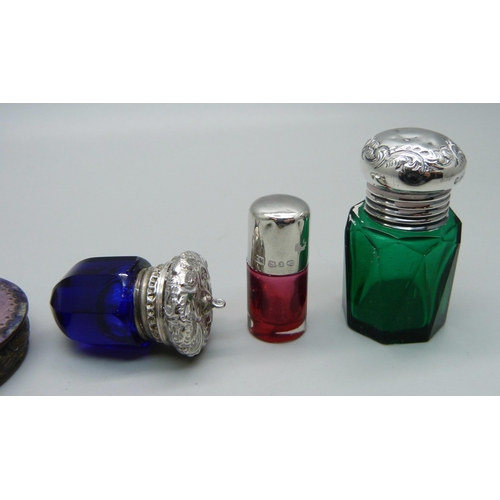 1052 - A pocket barometer, a/f, two silver topped scent bottles, a blue glass and white metal topped vinaig... 