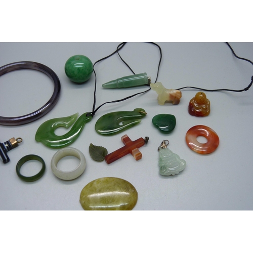 1054 - Assorted hardstone pendants, etc.