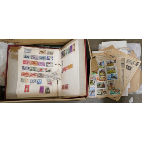 1063 - Stamps; albums, a folder and loose stamps **PLEASE NOTE THIS LOT IS NOT ELIGIBLE FOR POSTING AND PAC... 