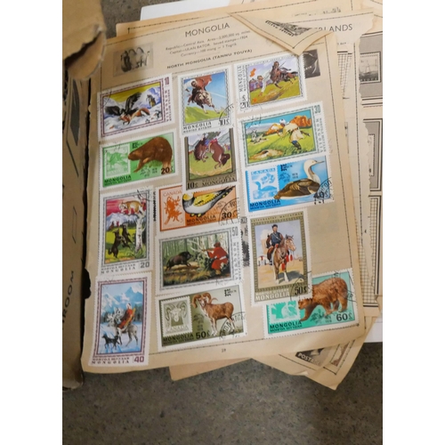 1063 - Stamps; albums, a folder and loose stamps **PLEASE NOTE THIS LOT IS NOT ELIGIBLE FOR POSTING AND PAC... 