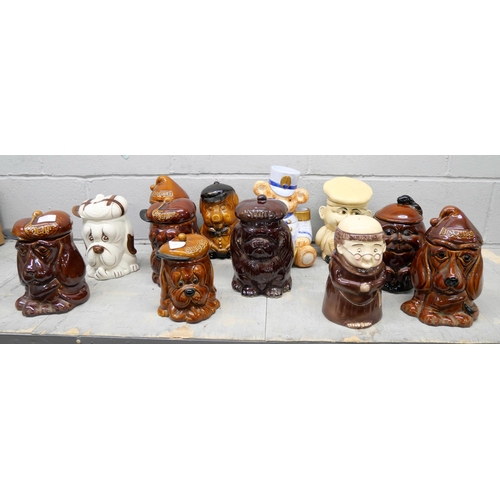 1074 - A collection of eleven novelty biscuits and sweets lidded jars, includes P & K sad dog, Teddy bear m... 