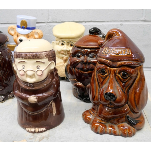 1074 - A collection of eleven novelty biscuits and sweets lidded jars, includes P & K sad dog, Teddy bear m... 