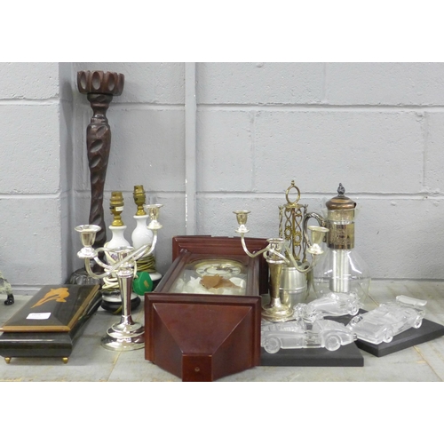 1079 - Two lamps, two candelabra, a wall clock, a musical jewellery box, three model glass cars, one a/f **... 