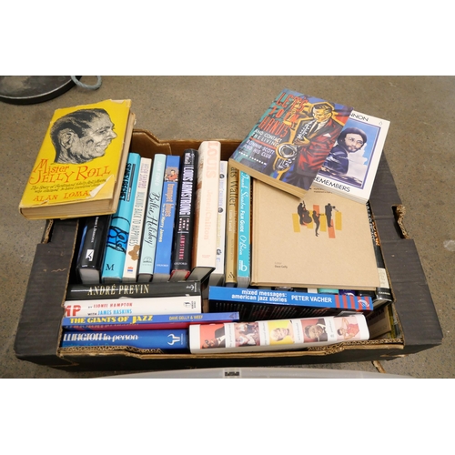 1091 - A box of cricket books and a box of jazz music books and jazz newsletters **PLEASE NOTE THIS LOT IS ... 