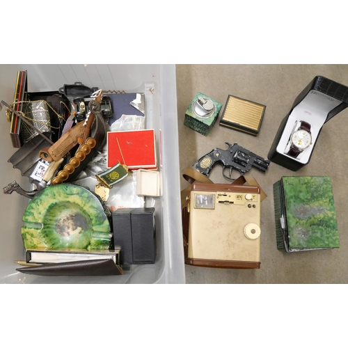 1094 - A box of assorted items; a Lone Star toy gun, a Kodak Brownie camera, a smoking set, watches, etc. *... 