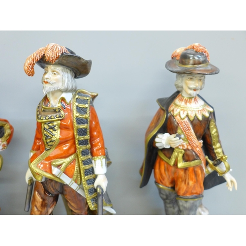 606 - A set of three German Unter Weiss Bach figures of the Three Musketeers, one sword on one figure a/f