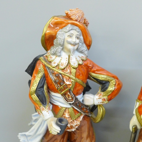 606 - A set of three German Unter Weiss Bach figures of the Three Musketeers, one sword on one figure a/f