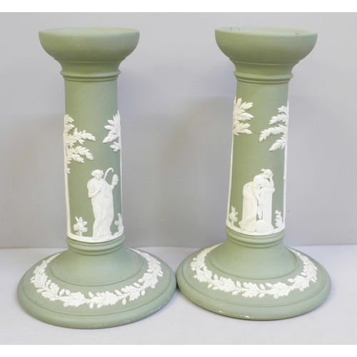 608 - A pair of Wedgwood green Jasper candlesticks, 17cm