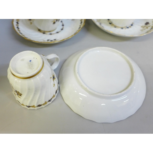 618 - Two Georgian blue and white tea bowls and saucers, circa 1780s, one a/f, three Georgian Worcester cu... 