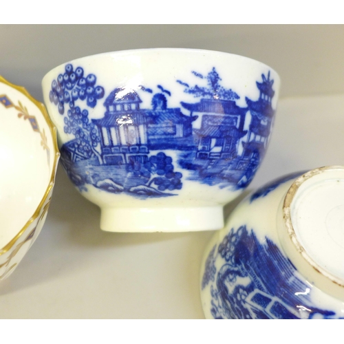 618 - Two Georgian blue and white tea bowls and saucers, circa 1780s, one a/f, three Georgian Worcester cu... 