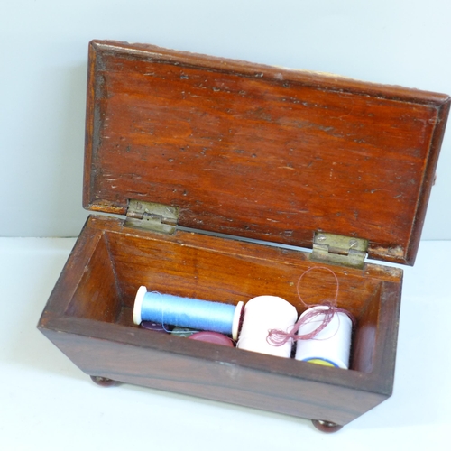 622 - An early 19th Century rosewood sewing box with pin cushion lid, 14cm