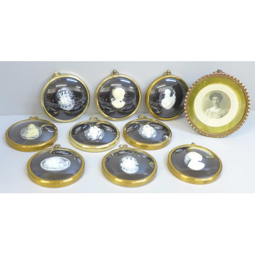 626 - Nine mounted cameos and a gilt brass photograph frame