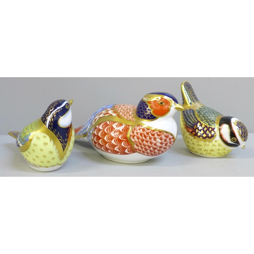 629A - Three Royal Crown Derby bird paperweights, two smaller Blue Tits with gold stoppers