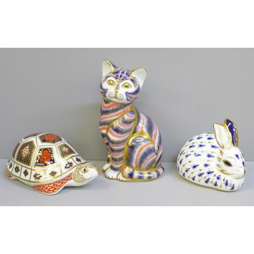 632 - Three Royal Crown Derby paperweights; rabbit and cat with gold stoppers, tortoise lacking stopper