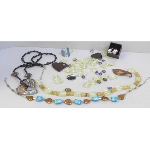 645 - Murano and other glass jewellery; three necklaces, earrings, a ring, pendants and loose beads