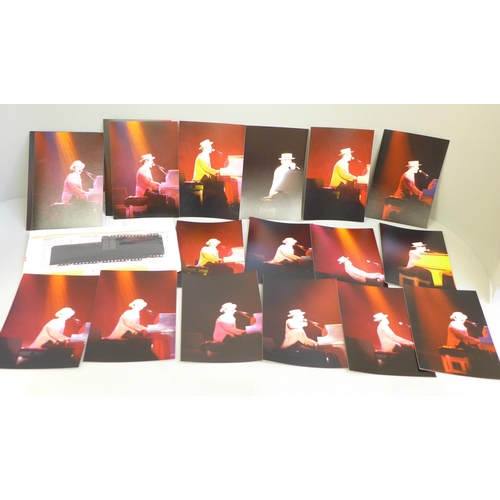 649 - Nineteen Elton John original concert photographs from the 1980s with negatives