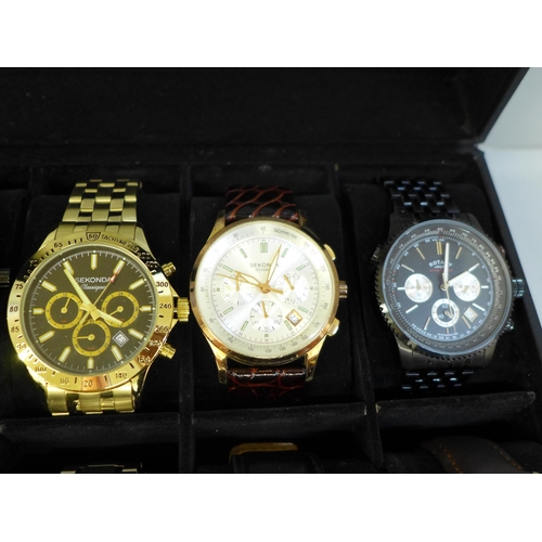 650 - A case of twelve fashion wristwatches, Accurist x3, Sekonda x2, Rotary, Slazenger, DKNY, etc.