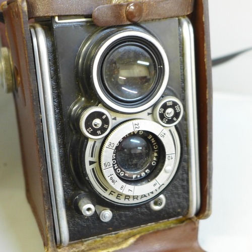 653 - A Ferrania TLR camera, cased