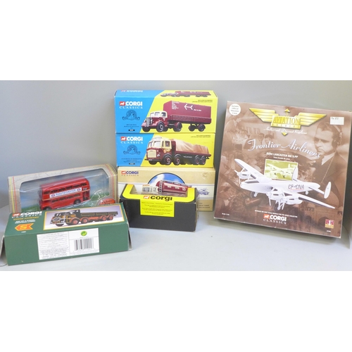 656 - A collection of seven Corgi Classics and other model vehicles, boxed