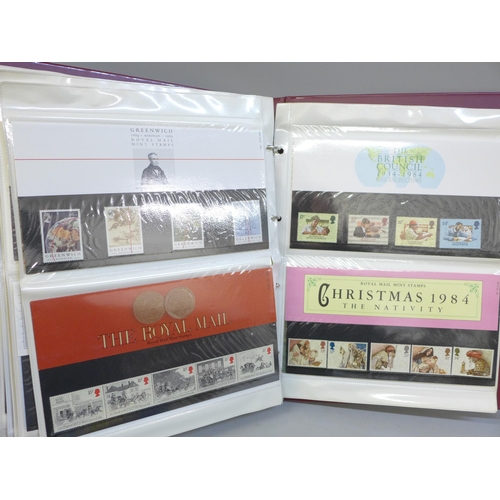 661 - An album of forty Royal Mail complete stamp sets of first day presentation packs from the early 1980... 