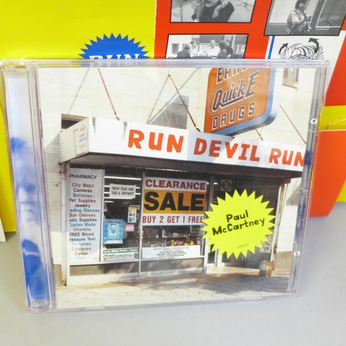 663 - A Paul McCartney Run Devil Run promo CD pack with photographs